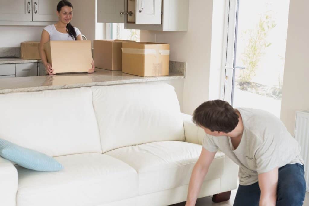 A young couple furnishing their new home