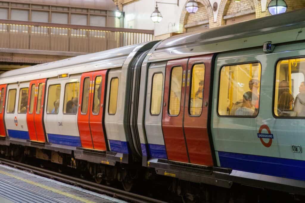 London Underground train full of passengers ready to depart the station