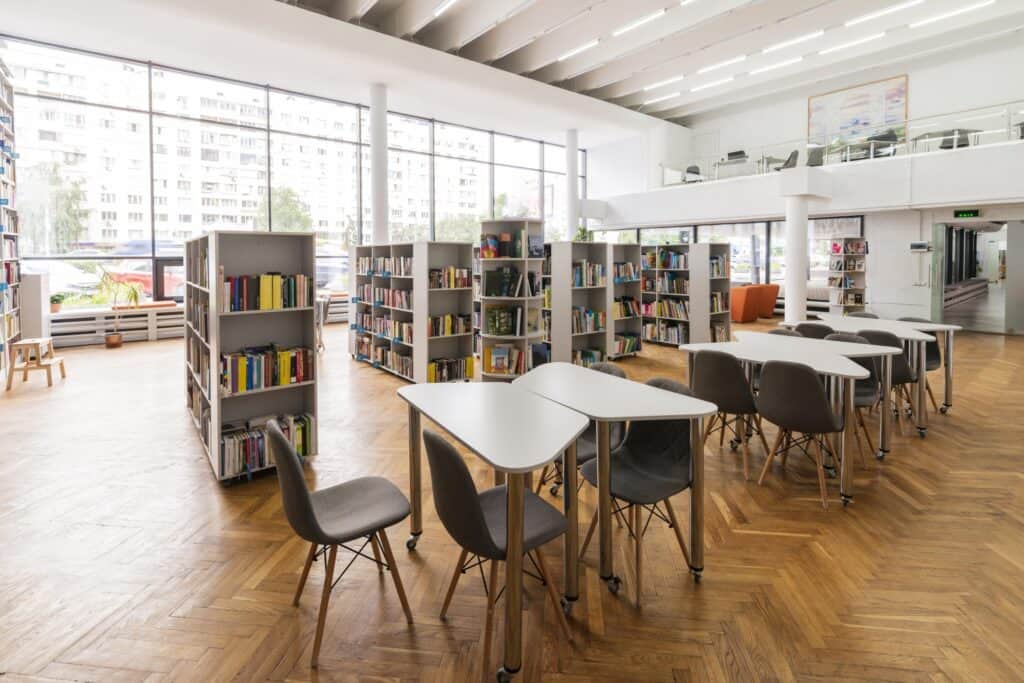 Empty modern school library in the concept of 'top schools in Fulham for families moving to the area'.